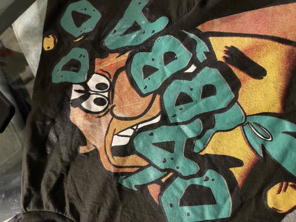 Flintstones NASCAR AOP Giant by Tee Jays tag legit?
