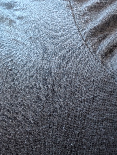 Any help with this UFO tee on a Fantasy A&G tag, the stitched in tags bug me