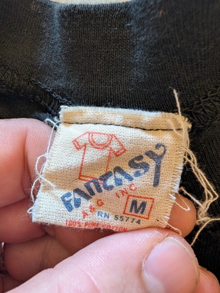 Any help with this UFO tee on a Fantasy A&G tag, the stitched in tags bug me