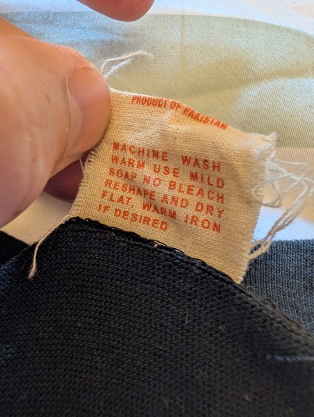 Any help with this UFO tee on a Fantasy A&G tag, the stitched in tags bug me