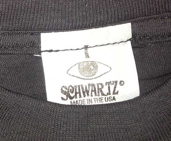 Schwartz tag sewn in over original label