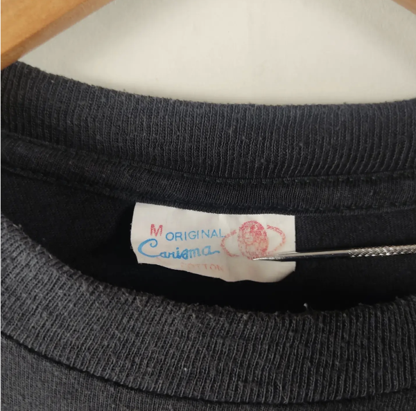 original carisma t-shirt tag
