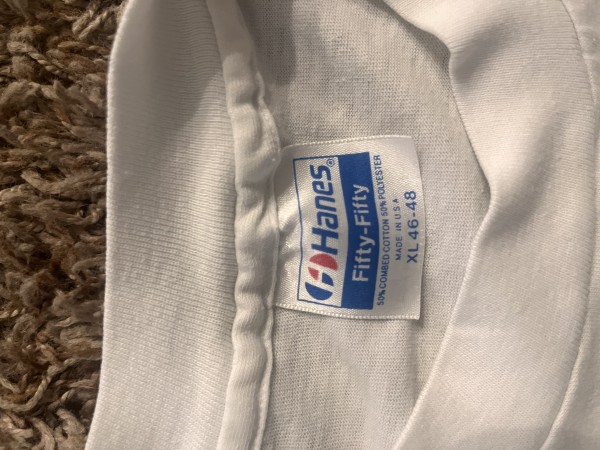 Price check for this vintage 80’s Donald Duck seat belt shirt