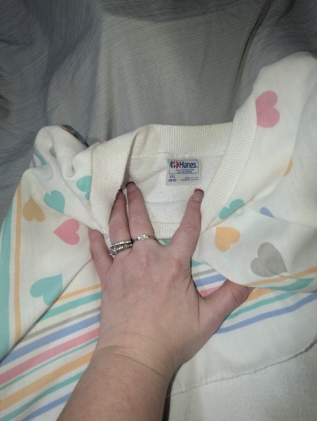 90's Hanes  sweatshirt colorful heart pattern and a unique attached, strip