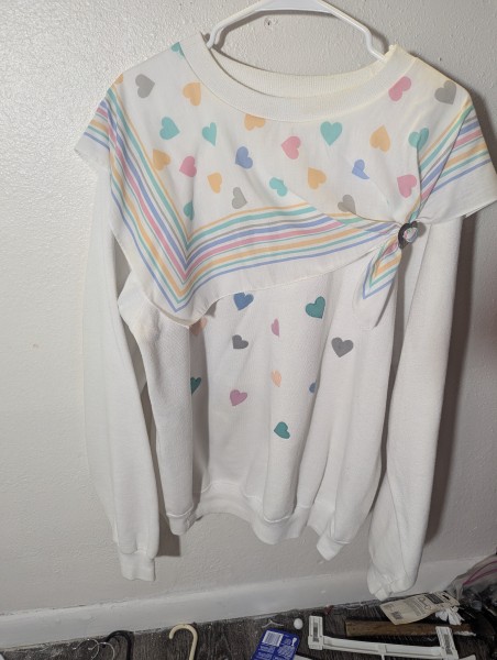 90's Hanes  sweatshirt colorful heart pattern and a unique attached, strip