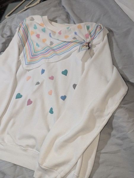 90's Hanes  sweatshirt colorful heart pattern and a unique attached, strip