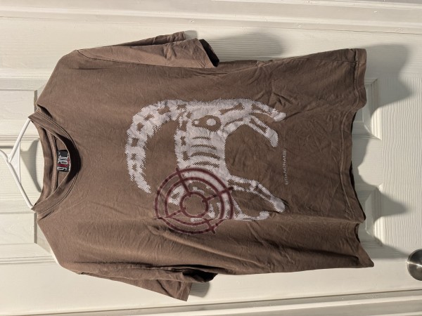 Need help identifying the print on this Giant Tag tee