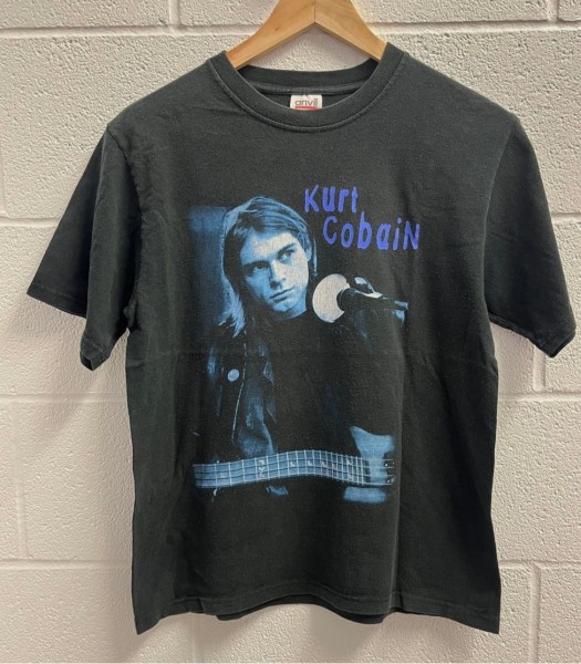 Does anyone know if this Vintage 2003 Kurt Cobain The End of Music notebook shirt is legit?