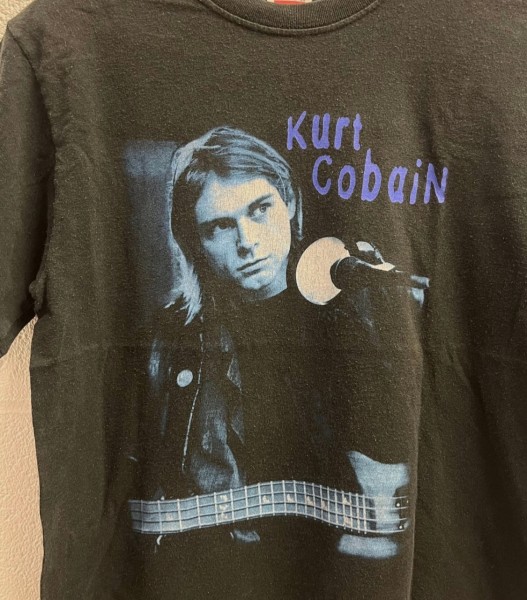 Does anyone know if this Vintage 2003 Kurt Cobain The End of Music notebook shirt is legit?
