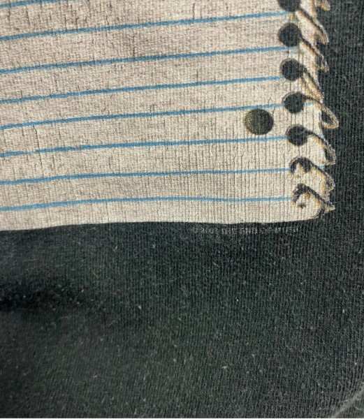 Does anyone know if this Vintage 2003 Kurt Cobain The End of Music notebook shirt is legit?