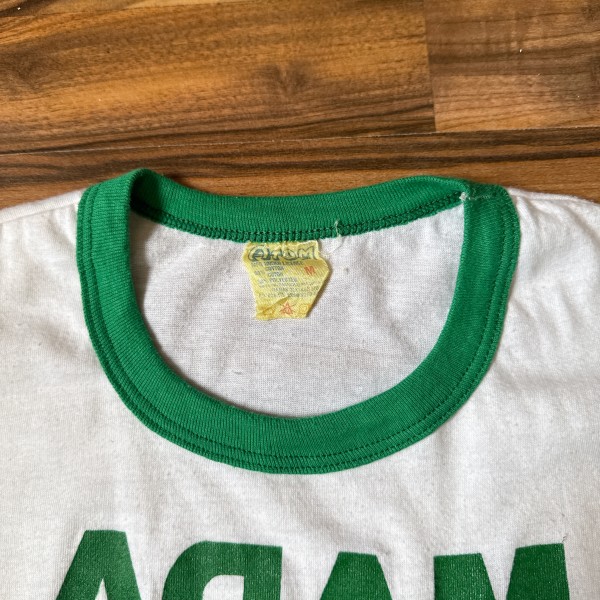 atom t-shirt tag