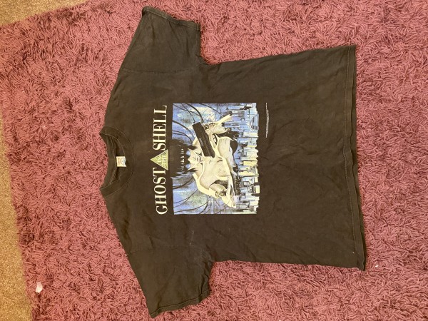 Is this a legit Ghost in the shell & if so what would it sell for?