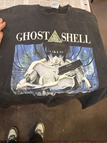 Is this a legit Ghost in the shell & if so what would it sell for?
