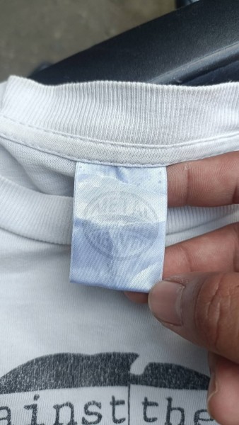 white metal heaven t-shirt tag