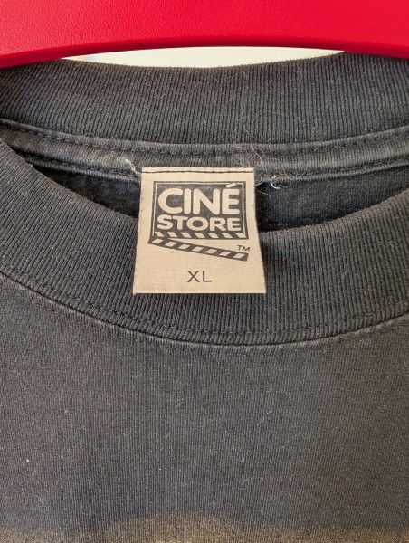 cine store t-shirt tag