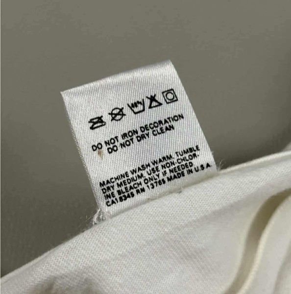 Hi! Would like to look for help in authenticating this shirt. Some say Legit some say Fake. Thank you!