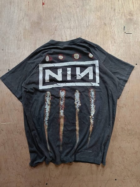Is this an authentic NIN Downward Spiral shirt? PolyGram tag instead of All Sport but has the hallmarks of the originals