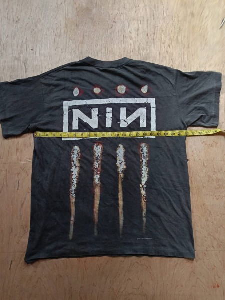 Is this an authentic NIN Downward Spiral shirt? PolyGram tag instead of All Sport but has the hallmarks of the originals