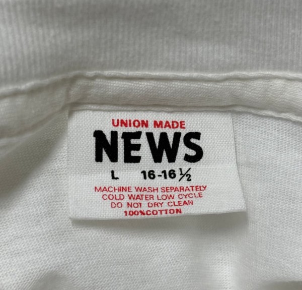 union made news t-shirt tag