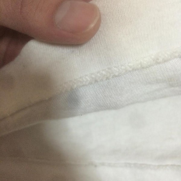 inner stitching bottom of tee