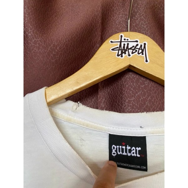 what tag ?  on printed band GUITAR