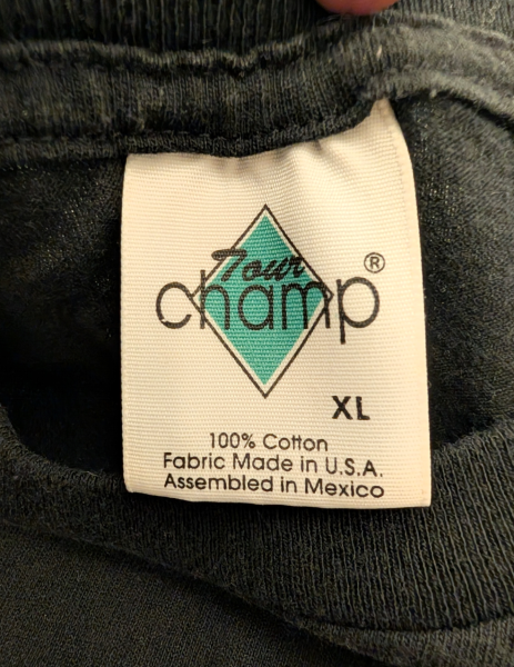 REM 1999  on a Tour Champ tag - dubious