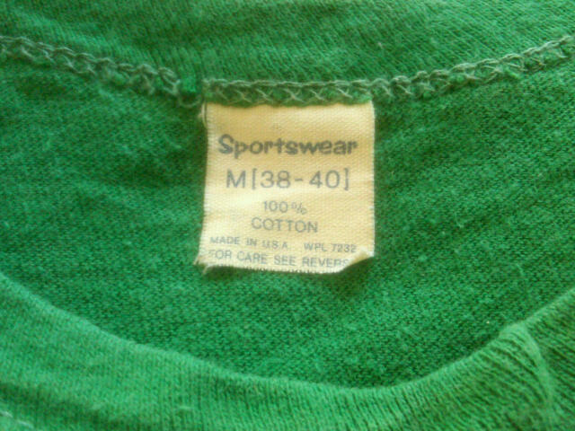 Label in t-shirt.  Sportswear, size Medium.  Label is much whiter than photo.