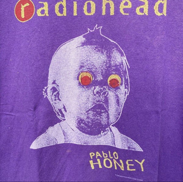 Check tag giant on radiohead tees