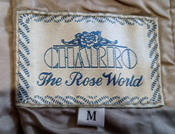 Can you help me identifying this The Roseworld shirt?