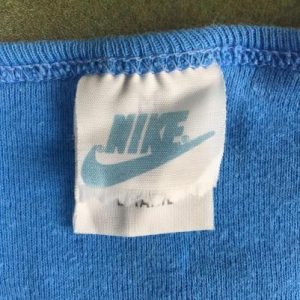 Vintage 80s Women's "Nike Country" Graphic Blue T-Shirt