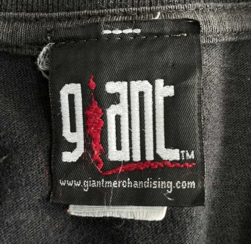 giant tag t-shirt with web address in lowercase