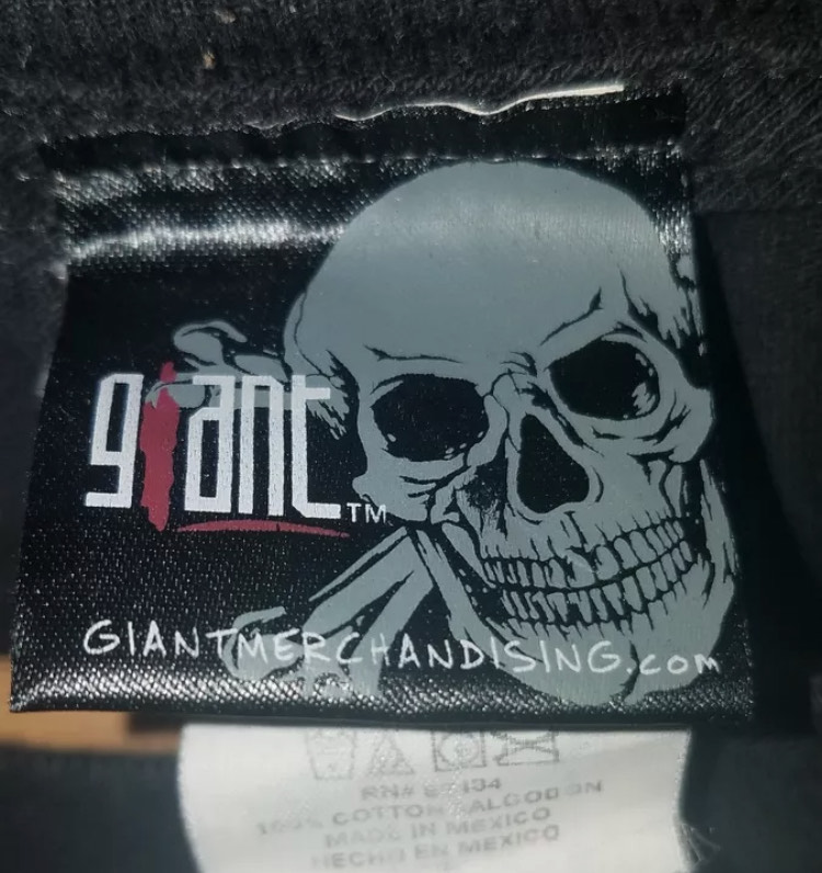 Giant Merchandising Skull Tag with giantmerchandising.com on it