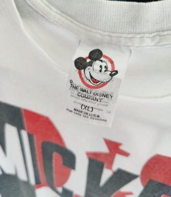 the walt disney company t-shirt tag mickey's face