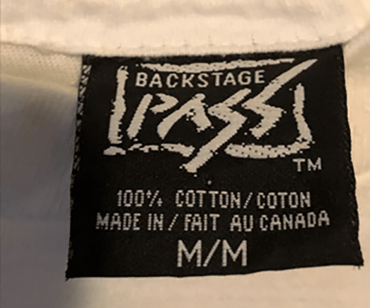 real backstage pass t-shirt tag with "TM"