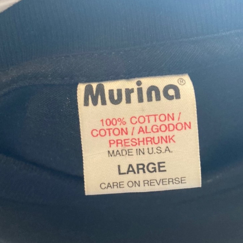 vintage murina t-shirt tag, with lots of text