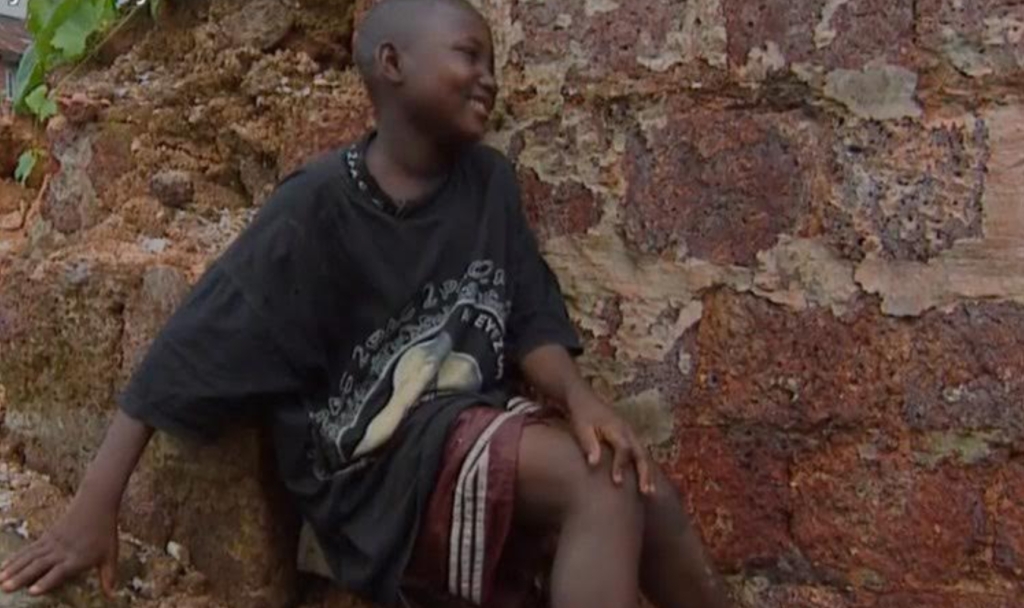 Child wearing Tupac t-shirt