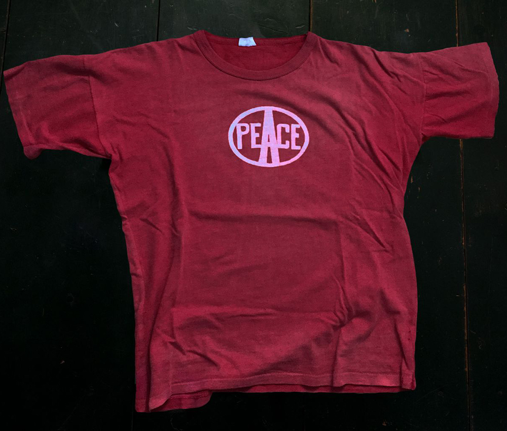 Vintage Red Woodstock Staff t-shirt Front Peace print