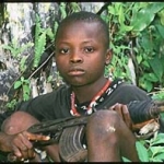 Young fighter with 2pac necklace